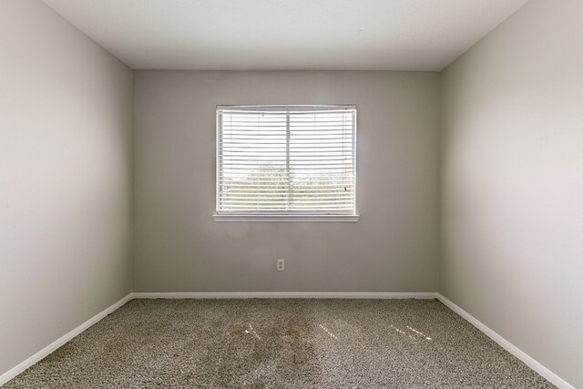 7850 Winding Creek Vw, Houston, TX 77072 - carpeted spare room featuring baseboards