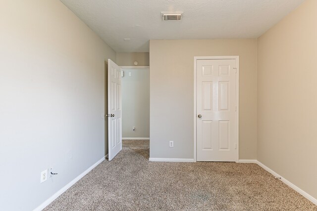7850 Winding Creek Vw, Houston, TX 77072 - unfurnished bedroom with carpet floors, visible vents, and baseboards