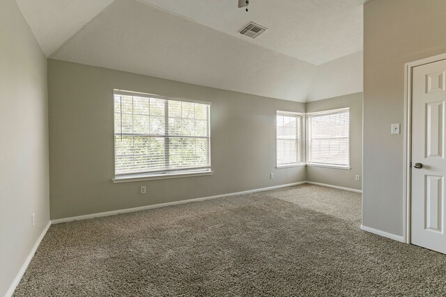 7850 Winding Creek Vw, Houston, TX 77072 - carpeted spare room featuring lofted ceiling, visible vents, and baseboards