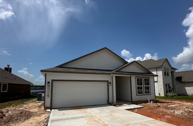 419 Shoreview Dr, Conroe, TX 77303 - view of front facade featuring a garage and driveway