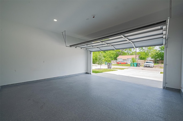 garage featuring baseboards