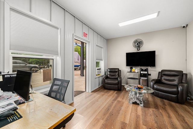 office space featuring wood finished floors