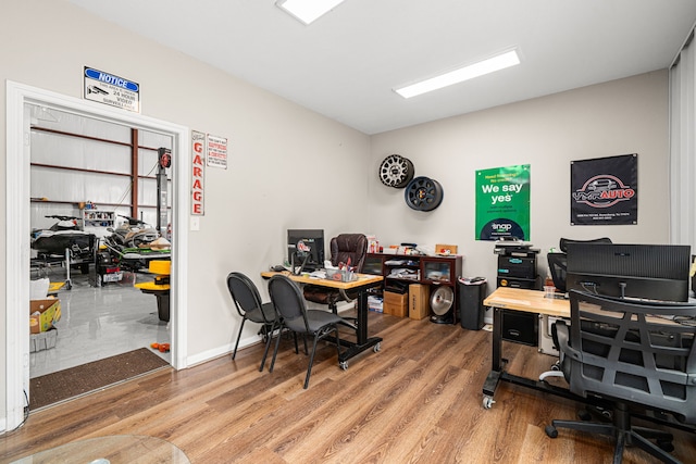 office area with wood finished floors