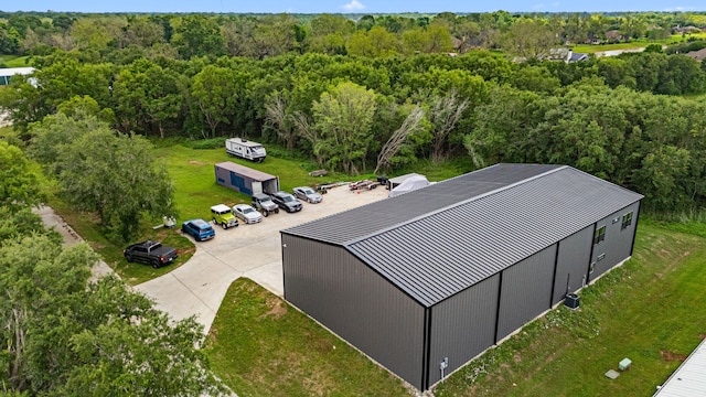 aerial view featuring a forest view