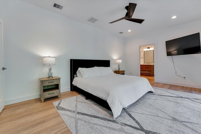 11571 Robin Ln, Conroe, TX 77303 - bedroom featuring baseboards, light wood finished floors, visible vents, and recessed lighting