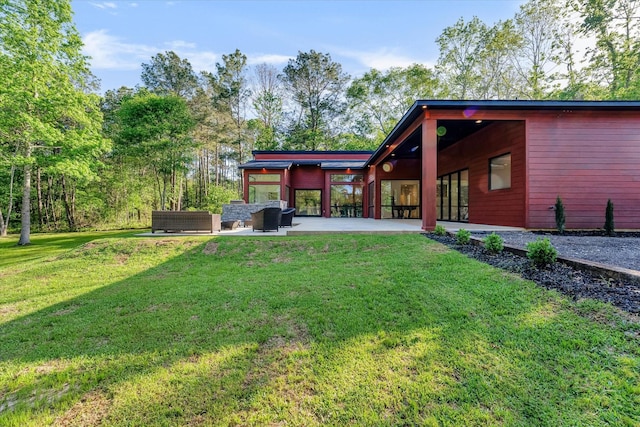 11571 Robin Ln, Conroe, TX 77303 - view of yard with a patio area and an outdoor hangout area
