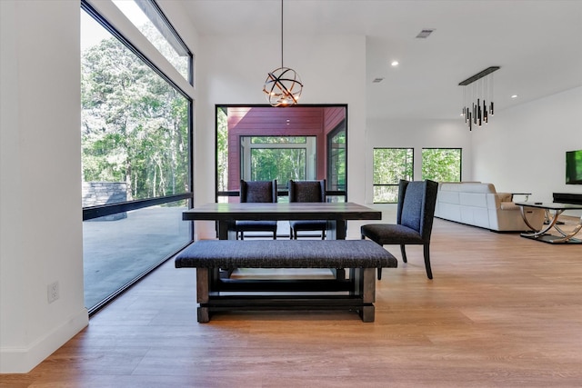 11571 Robin Ln, Conroe, TX 77303 - dining area with recessed lighting, visible vents, and light wood-style flooring