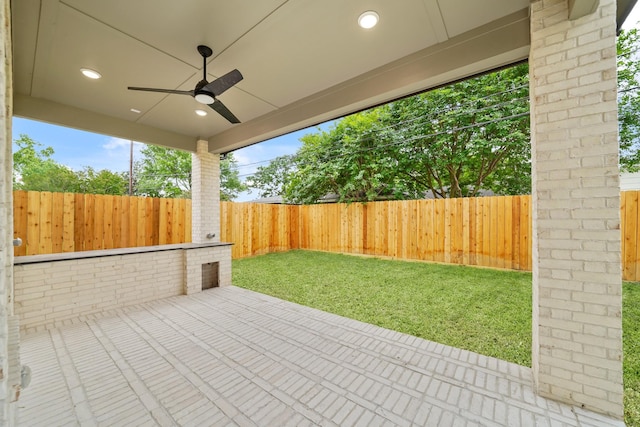 view of patio / terrace featuring ceiling fan and a fenced backyard