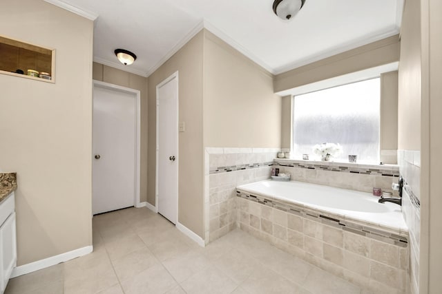 full bathroom featuring a bath, baseboards, tile patterned flooring, vanity, and ornamental molding