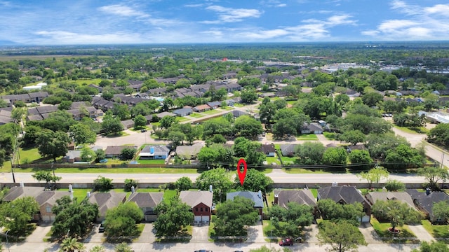 birds eye view of property with a residential view