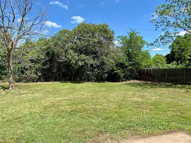 view of yard with fence