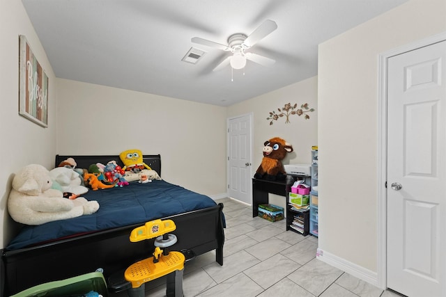 bedroom featuring visible vents, a ceiling fan, and baseboards