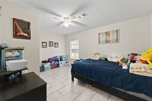 bedroom featuring a ceiling fan and visible vents