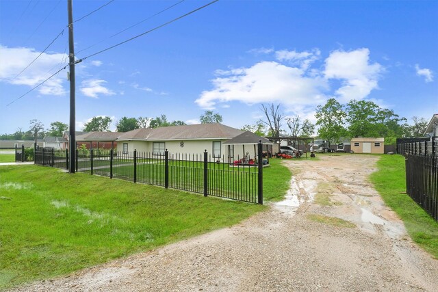 12901 Flagstaff Ln, Houston, TX 77049 - view of yard featuring driveway