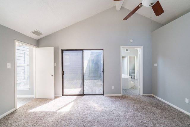 8810 Enchanted Forest Dr, Houston, TX 77088 - unfurnished bedroom with access to outside, high vaulted ceiling, visible vents, and carpet