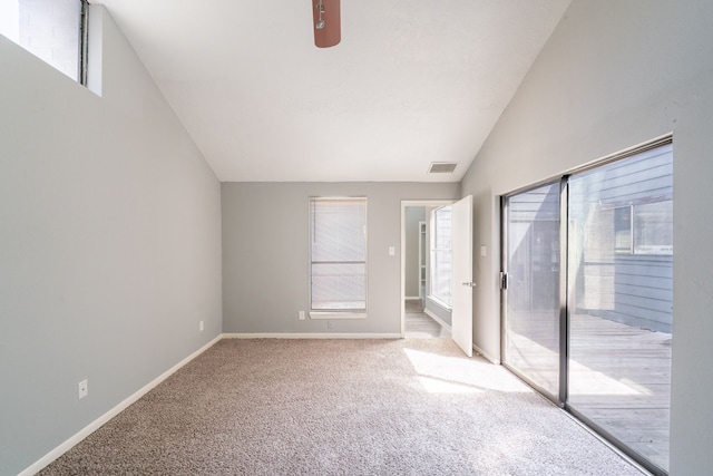 8810 Enchanted Forest Dr, Houston, TX 77088 - unfurnished bedroom featuring visible vents, vaulted ceiling, baseboards, access to outside, and carpet flooring