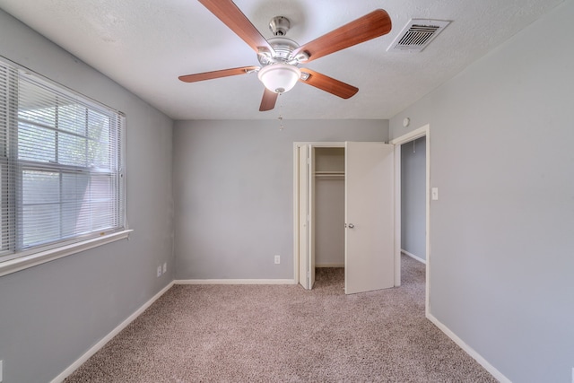 8810 Enchanted Forest Dr, Houston, TX 77088 - unfurnished bedroom with visible vents, a ceiling fan, a closet, baseboards, and carpet flooring