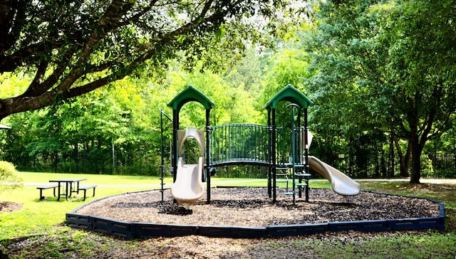communal playground with a lawn