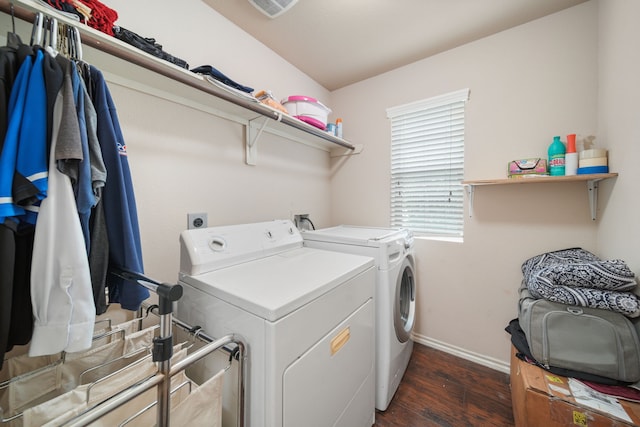 washroom with baseboards, independent washer and dryer, laundry area, and dark wood finished floors