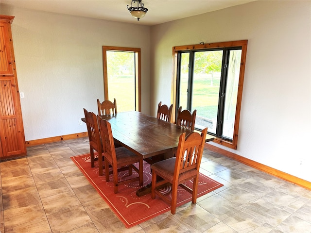 15395 Kitty Hawk Dr, Waller, TX 77484 - dining area featuring baseboards and a wealth of natural light