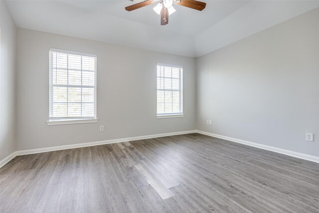 4934 S Cancun Dr, Houston, TX 77045 - unfurnished room with ceiling fan, baseboards, and wood finished floors
