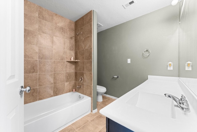 full bath with washtub / shower combination, tile patterned flooring, visible vents, toilet, and vanity