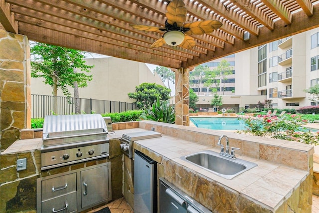 661 Bering Dr Unit 301, Houston, TX 77057 - view of patio / terrace with a sink, a pergola, a community pool, and ceiling fan
