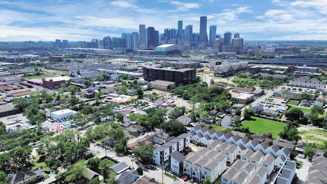 birds eye view of property featuring a view of city