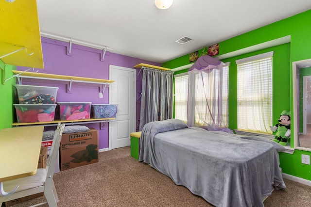 13207 Davenport Hills Ln, Humble, TX 77346 - carpeted bedroom with baseboards and visible vents
