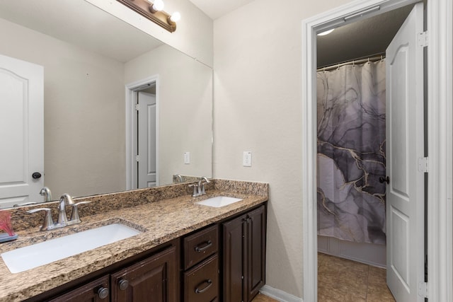 13207 Davenport Hills Ln, Humble, TX 77346 - full bath featuring double vanity and a sink