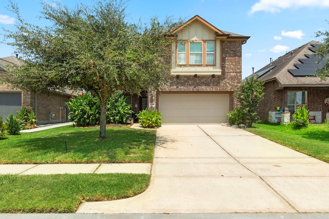 13207 Davenport Hills Ln, Humble, TX 77346 - view of front facade featuring brick siding, a front lawn, an attached garage, and driveway