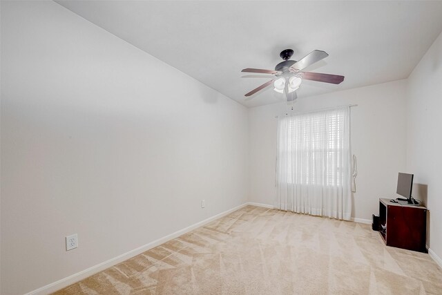 10506 Linsley Ln, Houston, TX 77034 - unfurnished room with baseboards, ceiling fan, and light colored carpet