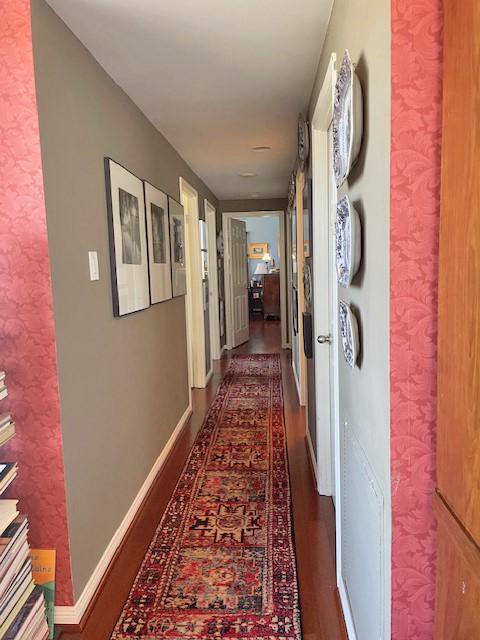 14 Greenway Plz Unit 8R, Houston, TX 77046 - hall featuring baseboards and dark wood finished floors