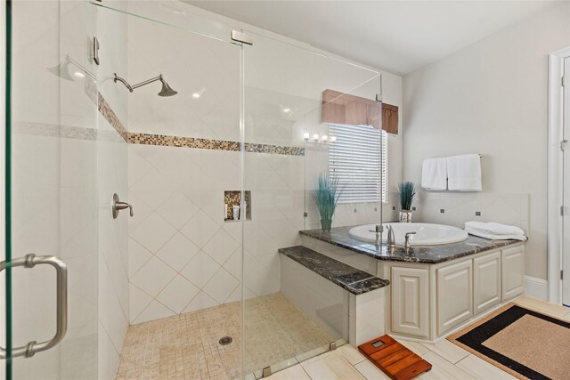 full bath featuring a bath and a stall shower