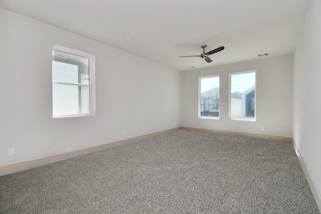 4012 Cusco Ln, Houston, TX 77045 - empty room with a wealth of natural light, a ceiling fan, visible vents, and carpet floors