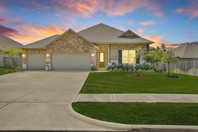 31411 Raleigh Creek Dr, Tomball, TX 77375 - view of front of house featuring an attached garage, concrete driveway, roof with shingles, brick siding, and stone siding