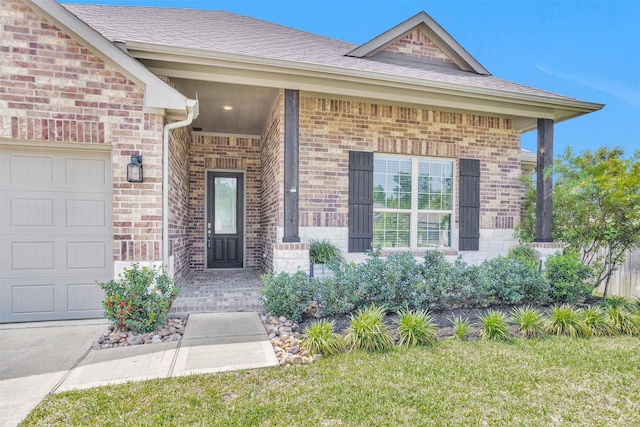 31411 Raleigh Creek Dr, Tomball, TX 77375 - doorway to property with brick siding, an attached garage, a shingled roof, and a lawn