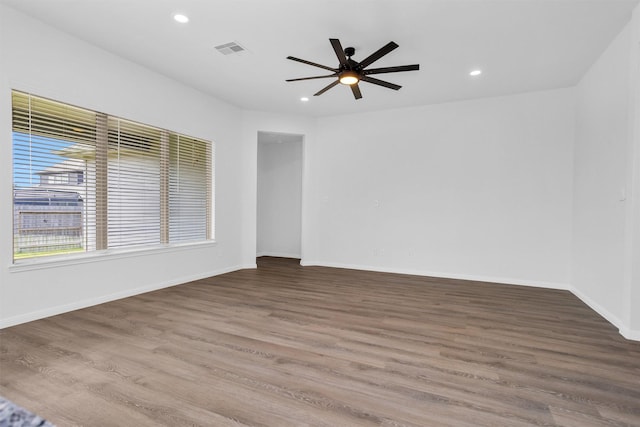31411 Raleigh Creek Dr, Tomball, TX 77375 - spare room featuring recessed lighting, wood finished floors, ceiling fan, and baseboards