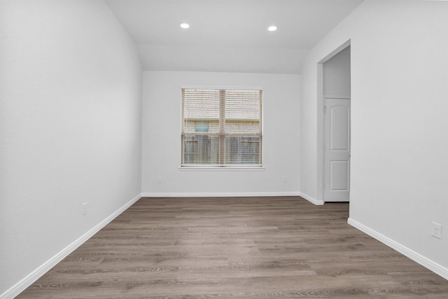 31411 Raleigh Creek Dr, Tomball, TX 77375 - unfurnished room featuring recessed lighting, wood finished floors, lofted ceiling, and baseboards