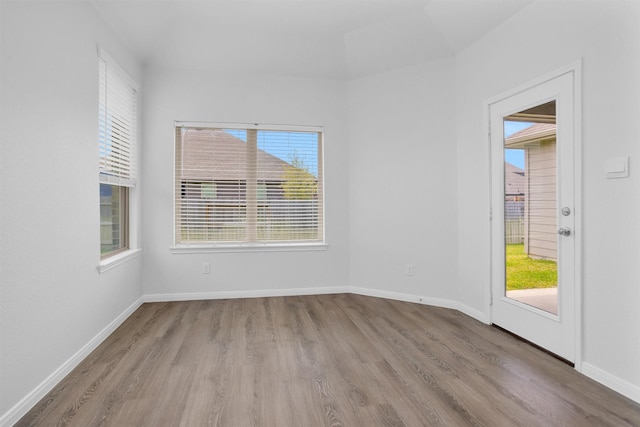 31411 Raleigh Creek Dr, Tomball, TX 77375 - empty room featuring wood finished floors and baseboards