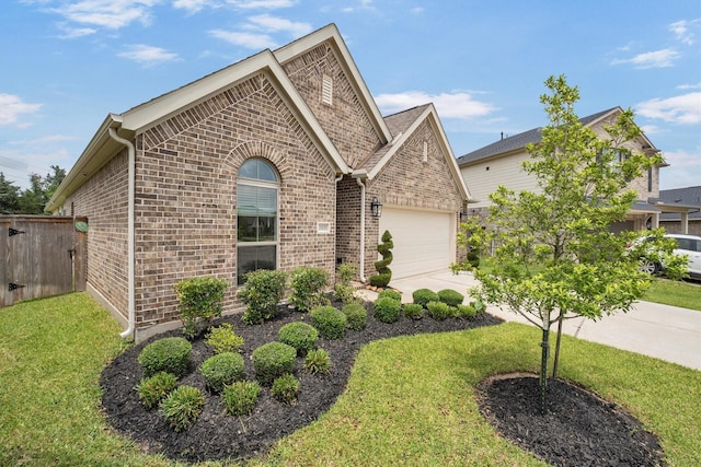 20131 Wild Horse Hollow Ln, Tomball, TX 77377 - view of front of house featuring brick siding, a garage, and driveway