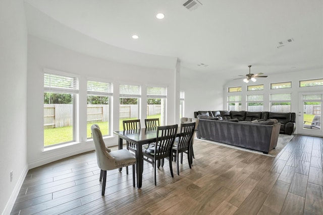 dining space featuring visible vents, wood finished floors, and ceiling fan