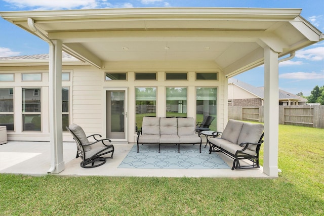 view of patio featuring an outdoor living space and fence