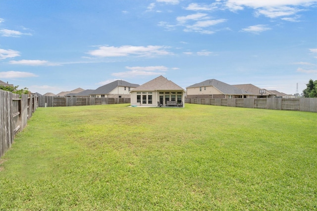 view of yard featuring a fenced backyard