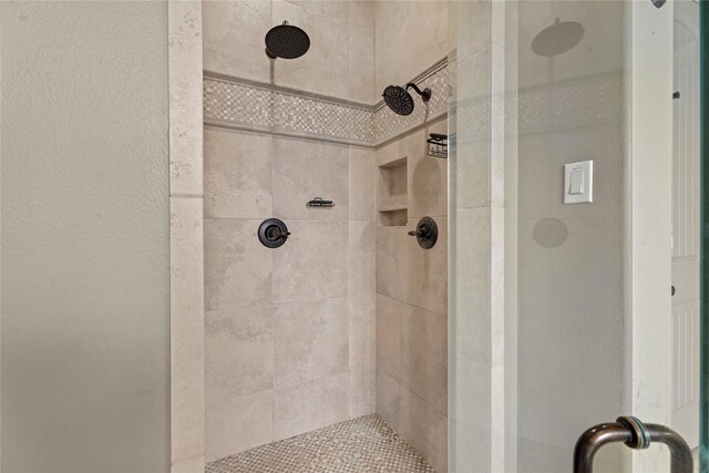 bathroom with a stall shower