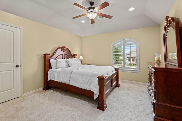 bedroom featuring ceiling fan, light carpet, and recessed lighting