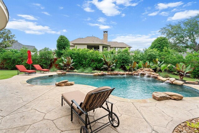 pool featuring a patio area