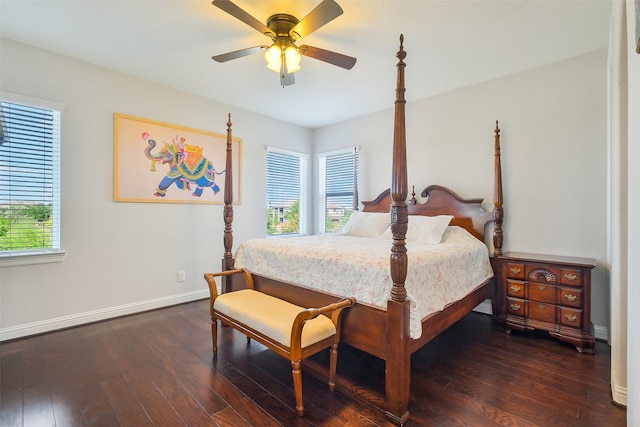 bedroom with a ceiling fan, baseboards, and wood-type flooring