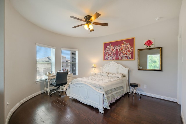 bedroom featuring ceiling fan, baseboards, and dark wood-style flooring