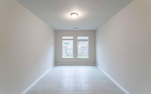 331 Riesling Dr, Alvin, TX 77511 - unfurnished room featuring light tile patterned floors and baseboards